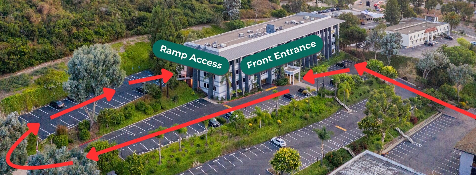 Aerial view of office building with ramp access and front entrance marked — directions and parking guidance for AlignSD Family Chiropractic